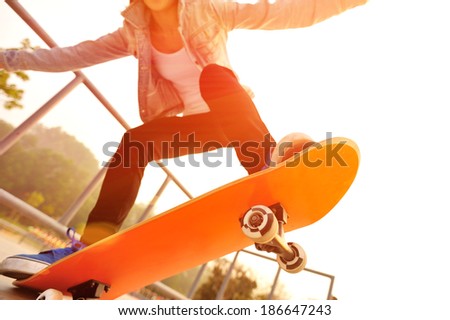 sunrise skateboarding woman 