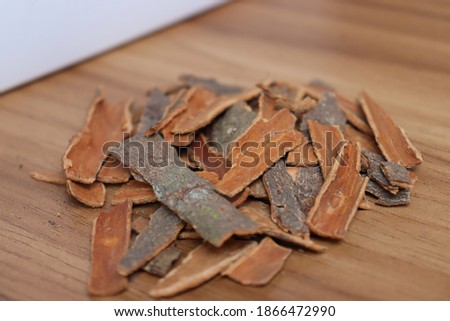 healthy and spicy cinnamon stock on wooden background