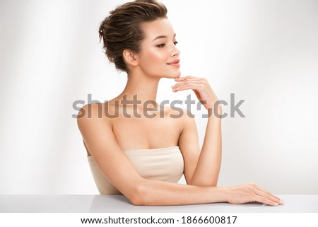 Beautiful woman with perfect makeup on white background. Beauty and skin care concept