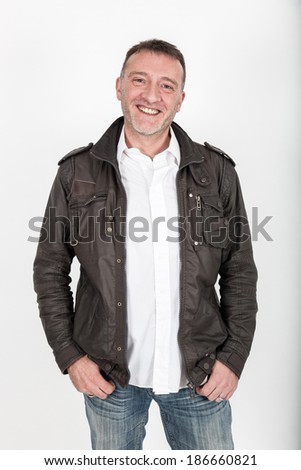 Handsome man posing in jeans