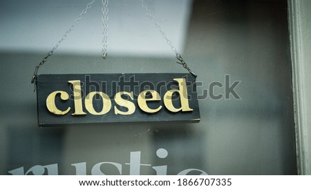 Shop closed sign during pandemic and lockdown