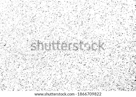 Grunge texture of a rough surface with noise, grit and dirt. Abstract monochrome background. Vector illustration. Overlay template.