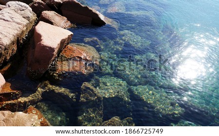 Beautiful clear sea water and rocks