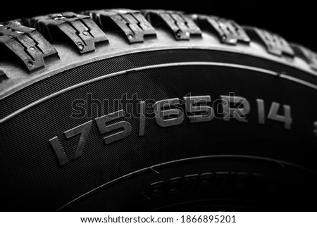 close up view for a tyre overall diameter label. tire with r14 radius for cars. Royalty-Free Stock Photo #1866895201