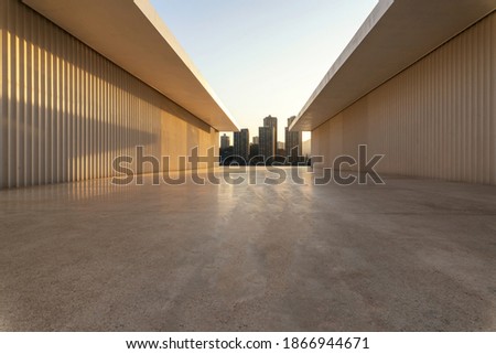 empty marble ground and cityscape of modern city. Royalty-Free Stock Photo #1866944671