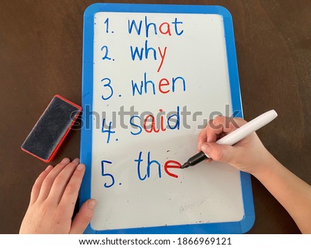Teaching primary students spelling the icky words using colour coding Royalty-Free Stock Photo #1866969121