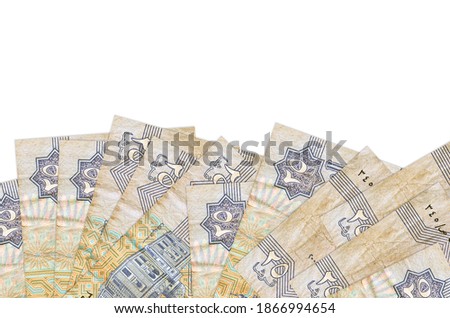 25 Egyptian piastres bills lies on bottom side of screen isolated on white background with copy space. Background banner template for business concepts with money