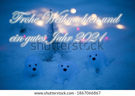 Polar bears in the snow, with fairy lights, Christmas greetings,