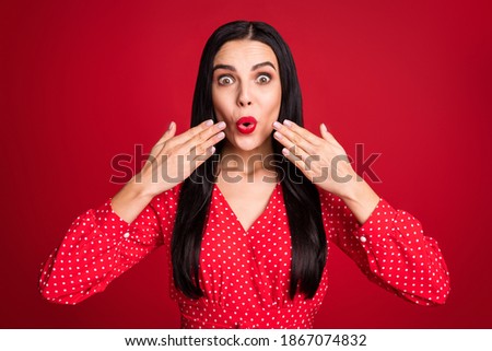 Close-up portrait of stunning amazed cheery lady pout lips news luck reaction isolated over bright red color background