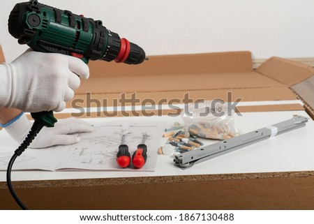 Close up picture of carpenter tools for furniture assembling at home