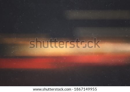 Old abstract wallpaper. Colorful light effect on black background. Retro image. 80s