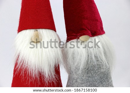 Christmas gnomes with a red hat isolated on a white background.