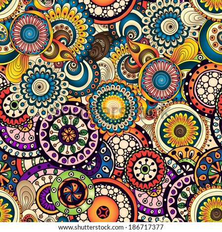 Seamless doodle flower background in vector. Circles ethnic floral pattern. Used Clipping mask for easy editing.