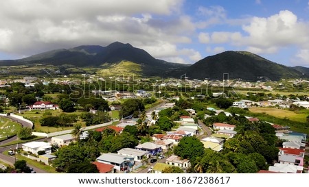 Basseterre, St Kitts: Aerial shot of a beautiful mountains and sky in the residential hoses area