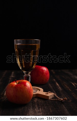Glass goblet with apple juice