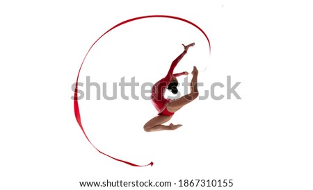 Rhythmic gymnast isolated on white.