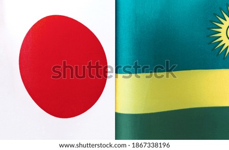 fragments of the national flags of Japan and Rwanda close-up