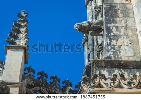 gargoyle of an ancient gothic portugal monastery of Batalha