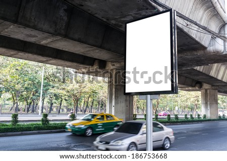 car passing through blank advertisement mupi
