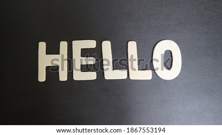 Hello letter on black background. Concept for business, finance and art.