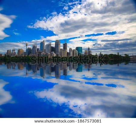 Sydney CBD skyline with reflection of buildings in the harbour waters 