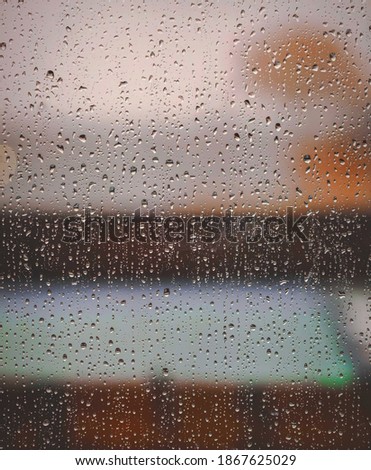 Blurry picture of glass and the rain drops