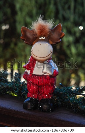 Reindeer rudolf is preparing for the holidays