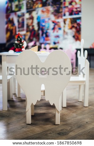 Small highchairs for children in the Christmas room