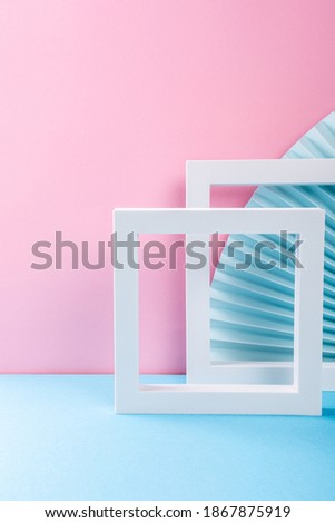Composition of different geometric objects white frames products presentation or exhibitions. Colorful abstract background with multicolored paper fans, light blue, pink. Trend Concept with copy space