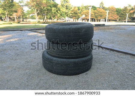 A picture of a stacked car wheel