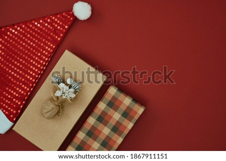 Gift boxes on a red background. Christmas and New Year's decor. Copy space, mock up