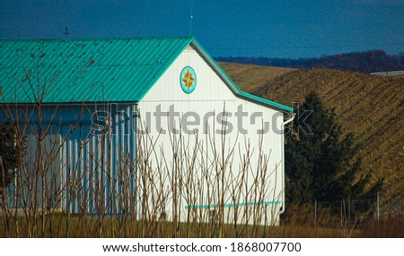 Barn in the Countryside with a Hex Sign