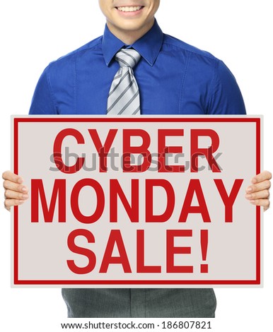 A man holding a sign indicating Cyber Monday Sale 