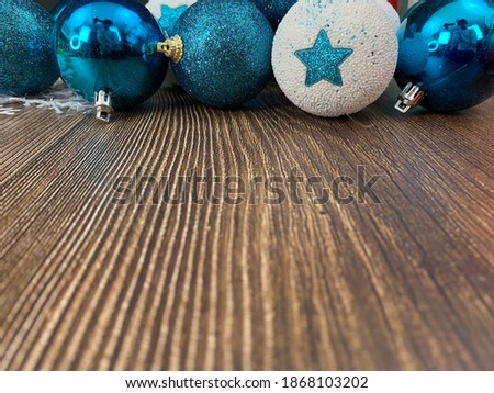 Christmas motifs and celebrations with gifts on a wooden background, with space to place text