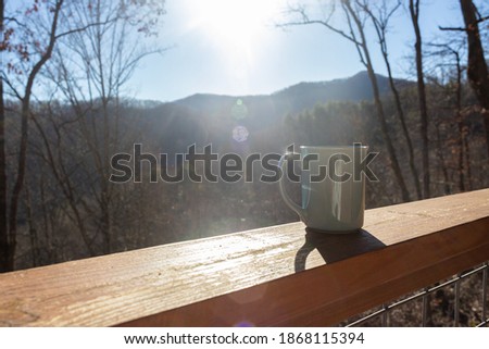 MORNING COFFEE MUG ON PORCH, MOUNTAIN VIEWS