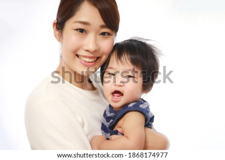 Image of smiling parents and children