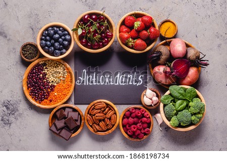 Healthy foods high in antioxidants, top view. Royalty-Free Stock Photo #1868198734