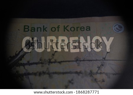 Currency letter and Korean Won (KRW) as background. Concept for finance, economy, budget and investment.