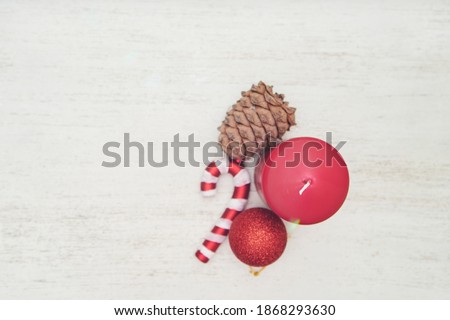 Candle on white table christmas festive background