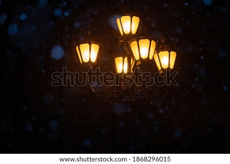 Closeup of lantern on Market square in Lviv, Ukraine at night