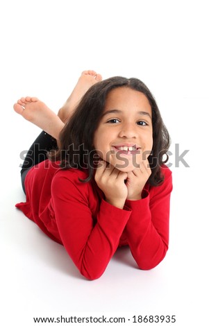 Young Girl Posing Against A White Background
