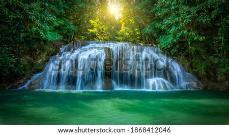 Waterfall in Thailand.View of Erawan waterfall in deep forest at kanchanaburi province,Thailand. Selective focus.

