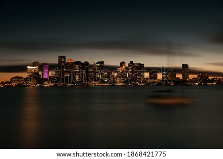 Boston skyline view at night with historical buildings in Massachusettes USA