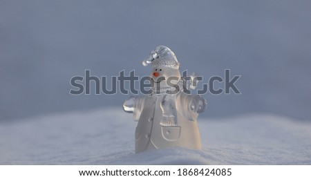 christmas ice snowman in the snow