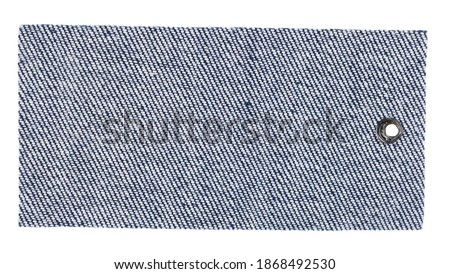 Blue denim clothing label isolated on white background.