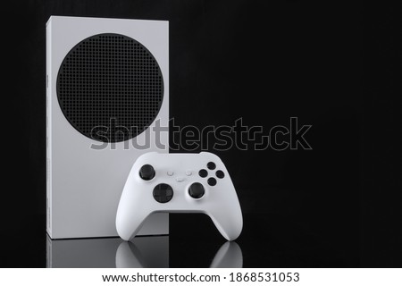 Next gen console and controller Royalty-Free Stock Photo #1868531053
