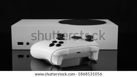 Next gen console and controller Royalty-Free Stock Photo #1868531056