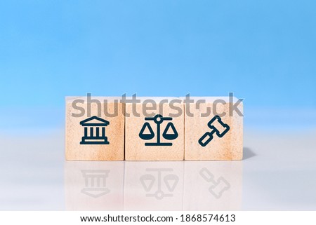 Concept of law and justice. Wooden block cube shape with icon law legal justice Royalty-Free Stock Photo #1868574613
