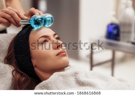 The woman is massaged face and body. High quality photo