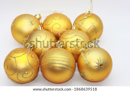 golden christmas balls isolated on white background. Decoration for new year and christmas.New year concept.Elements for christmas design.Christmas, New Year.The concept of celebration and fun
